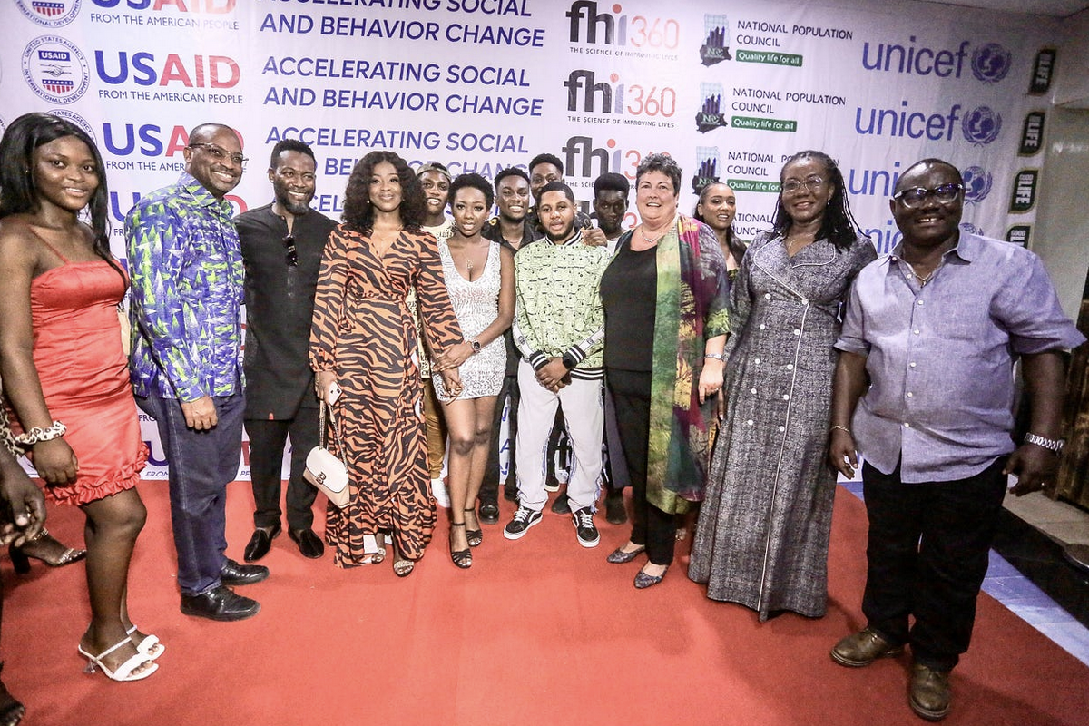 U.S. Ambassador to Ghana Virginia Palmer (front row, third from right) and some current and previous YOLO cast members at the premiere of YOLO Season 6 on Jan. 20, 2023. The series reached adolescent girls in Ghana with information about menstrual health and hygiene, peer pressure, navigating parent-teen relationships, bullying, teacher-student relationships, alcohol and drugs, and the importance of respectful, safe, and healthy romantic relationships.